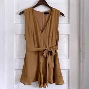 Sleeveless Plunging V-Neck Mini Romper with Pockets